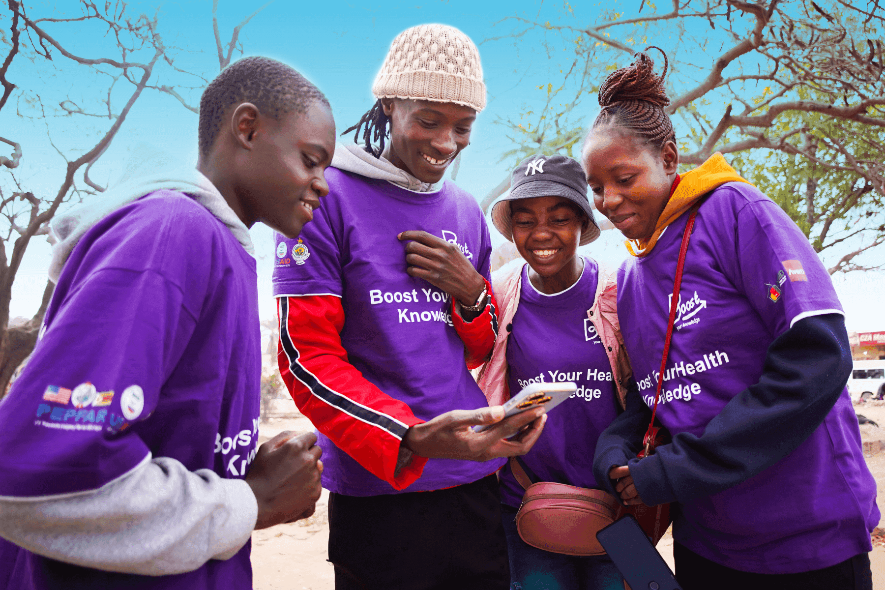 Group of community health workers with the Boost app