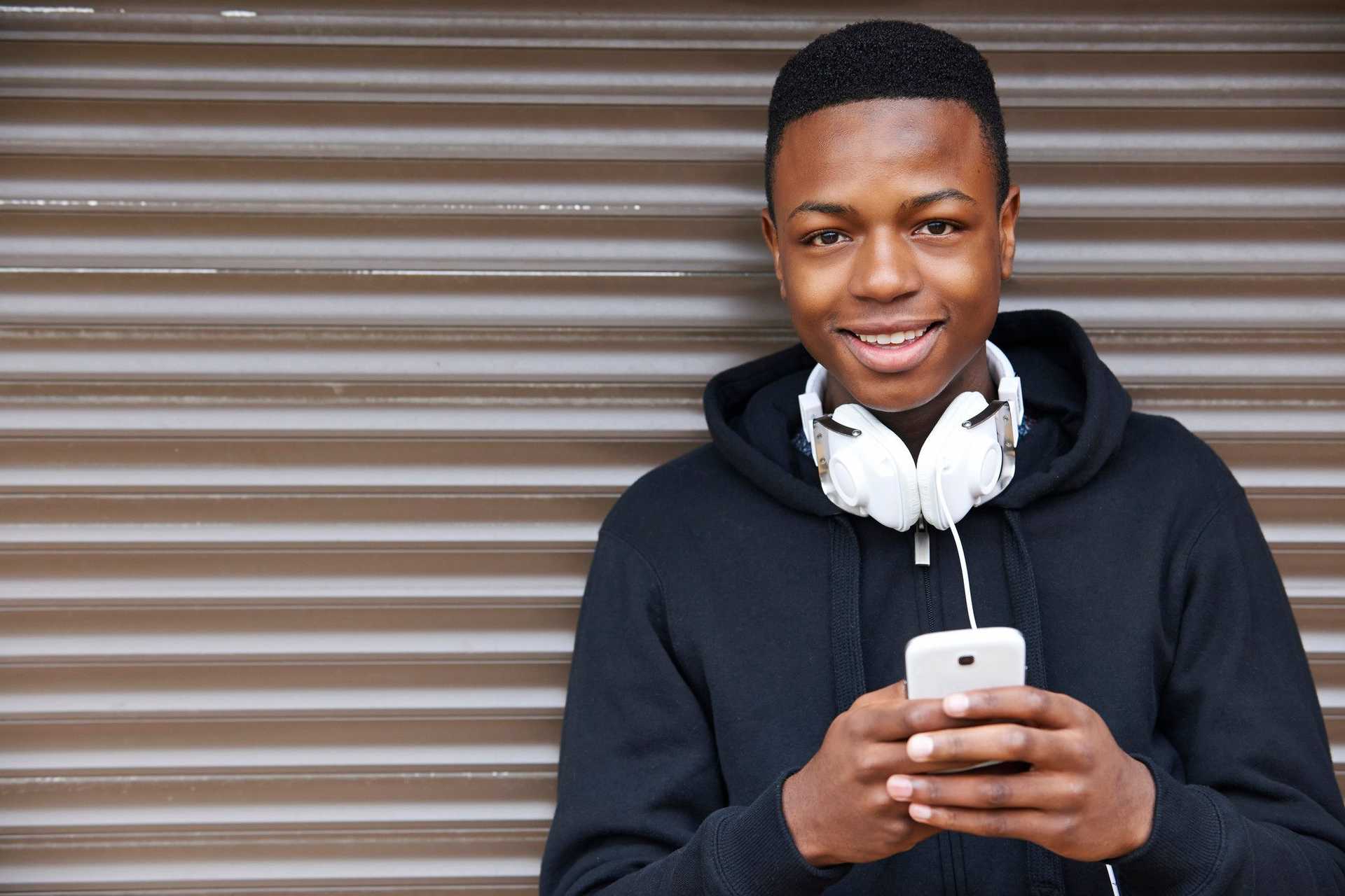 young guy on mobile phone